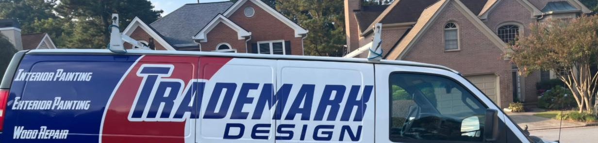 Trademark Design Painting and Decorating company van parked at a Metro Atlanta home